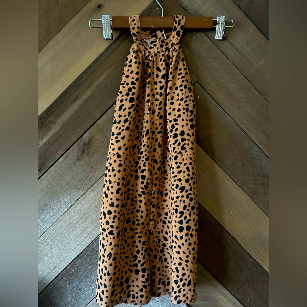 Kids cheetah romper fits like a 5/6 great condition